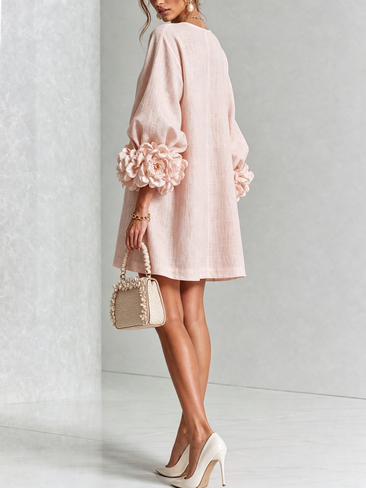 Katia | Minivestido floral rosa con mangas de rosetas