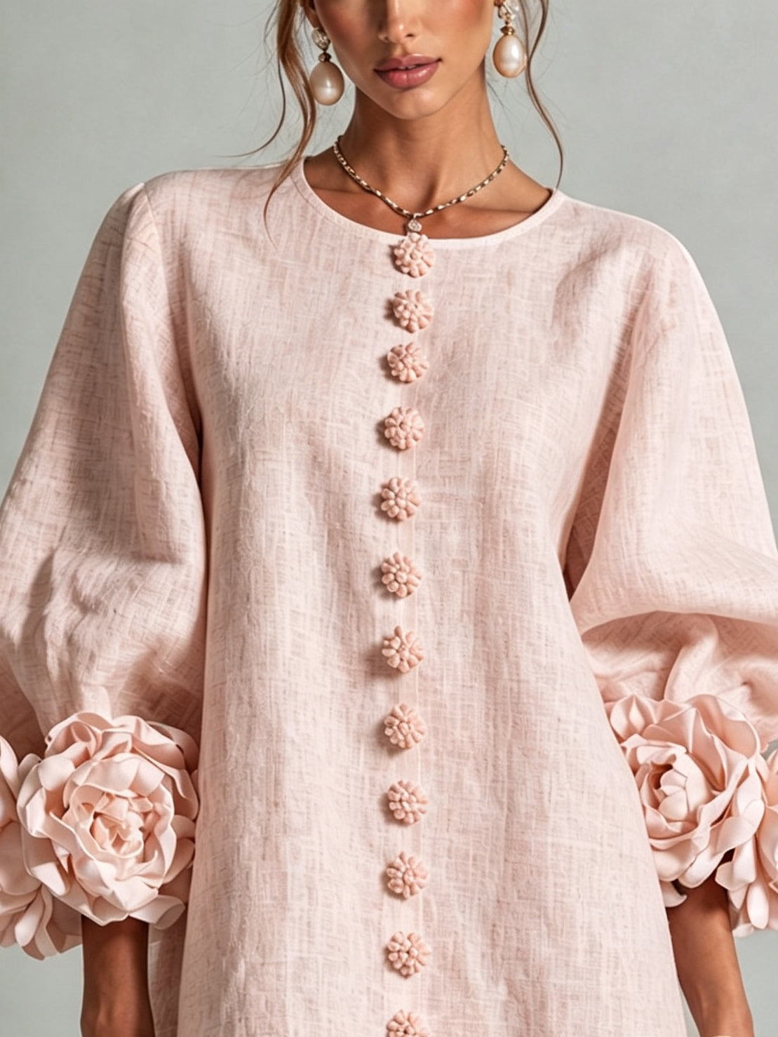 Katia | Minivestido floral rosa con mangas de rosetas