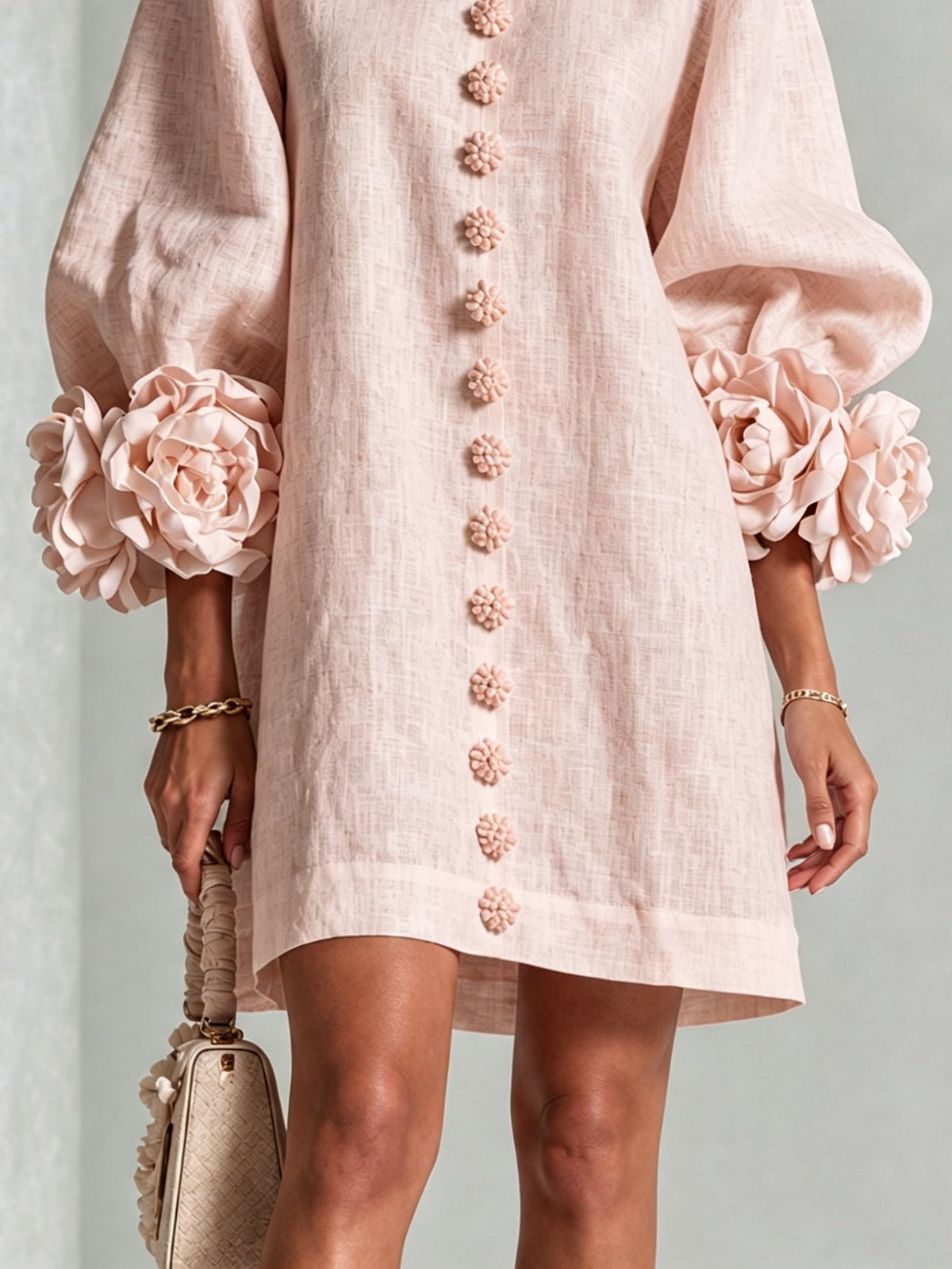 Katia | Minivestido floral rosa con mangas de rosetas