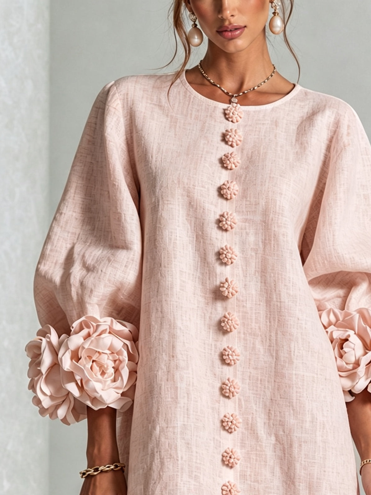 Katia | Minivestido floral rosa con mangas de rosetas