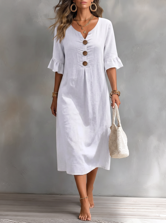 Vanesa Vestido de Lino con Manga Abullonada con fondo gris texturizado