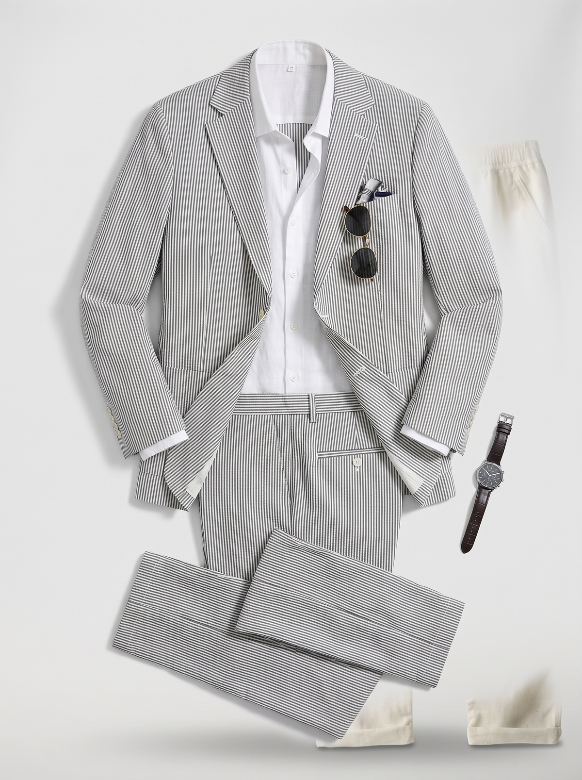 Hugo Conjunto Elegante de Verano, prendas sobre fondo claro