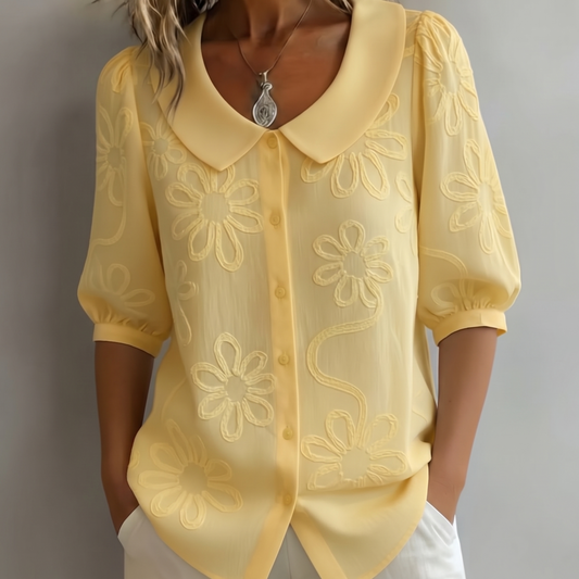 Top Tessa Floral Natural con fondo gris claro